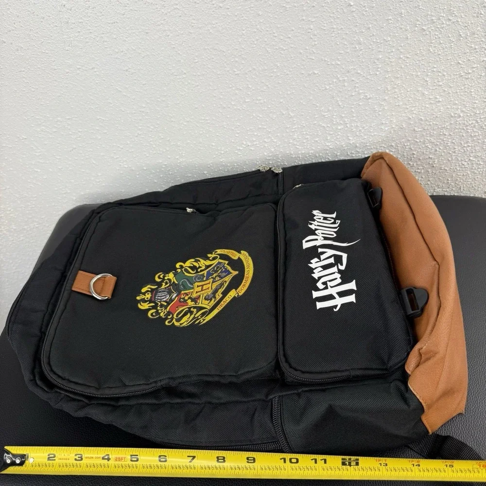 HARRY POTTER black Back Pack With Brown Leather Accents And House Crest Logo